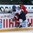 ZUG, SWITZERLAND - APRIL 17: Finland's Julius Mattila #28 takes out Switzerland's Alain Bircher #5 during preliminary round action at the 2015 IIHF Ice Hockey U18 World Championship. (Photo by Francois Laplante/HHOF-IIHF Images)